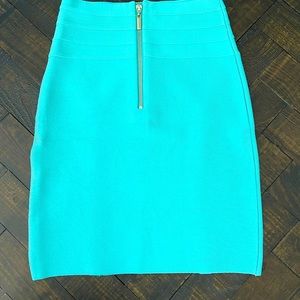 BEBE skirt, size S in turquoise blue.